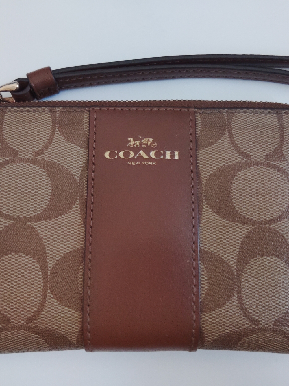 COACH Brown Signature Canvas Wristlet with Dark Brown Leather Strap